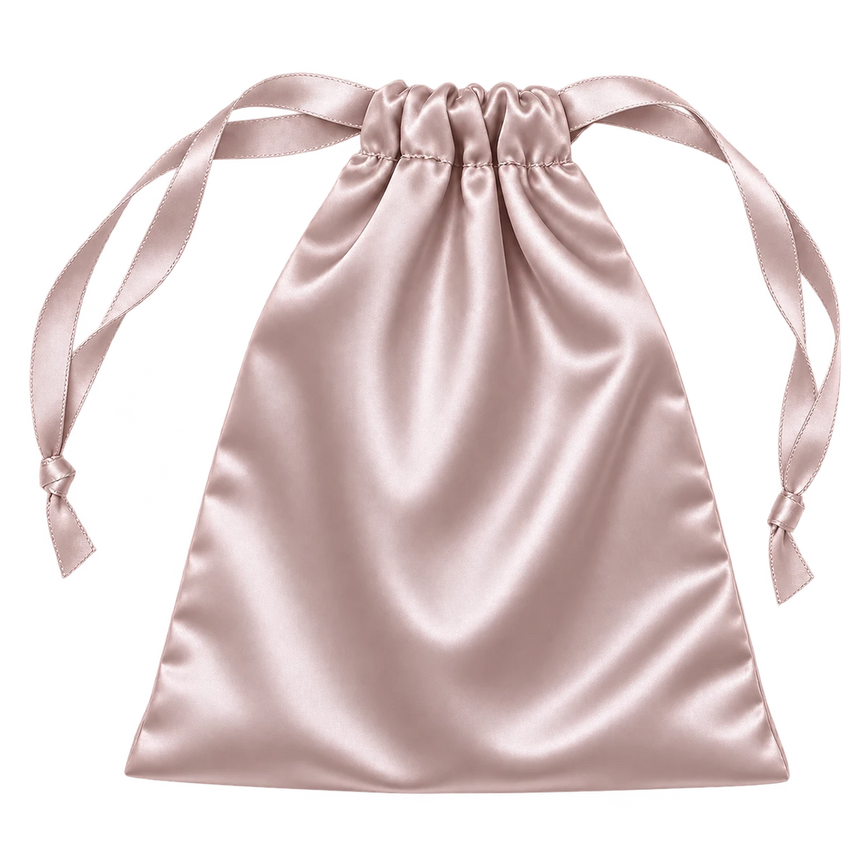 A pink silk drawstring travel pouch for a sleep mask, ribbon ties knotted at each end
